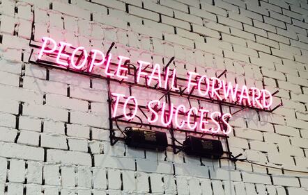A neon sign about disappointment: 